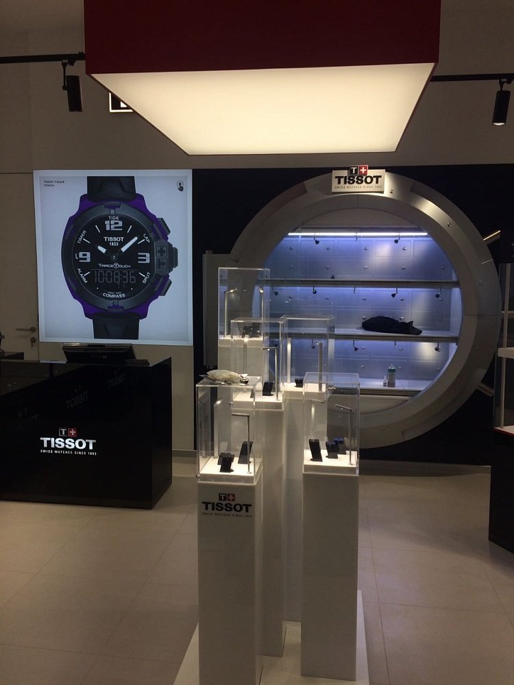 Оформление освещения для магазина швейцарских наручных часов Tissot