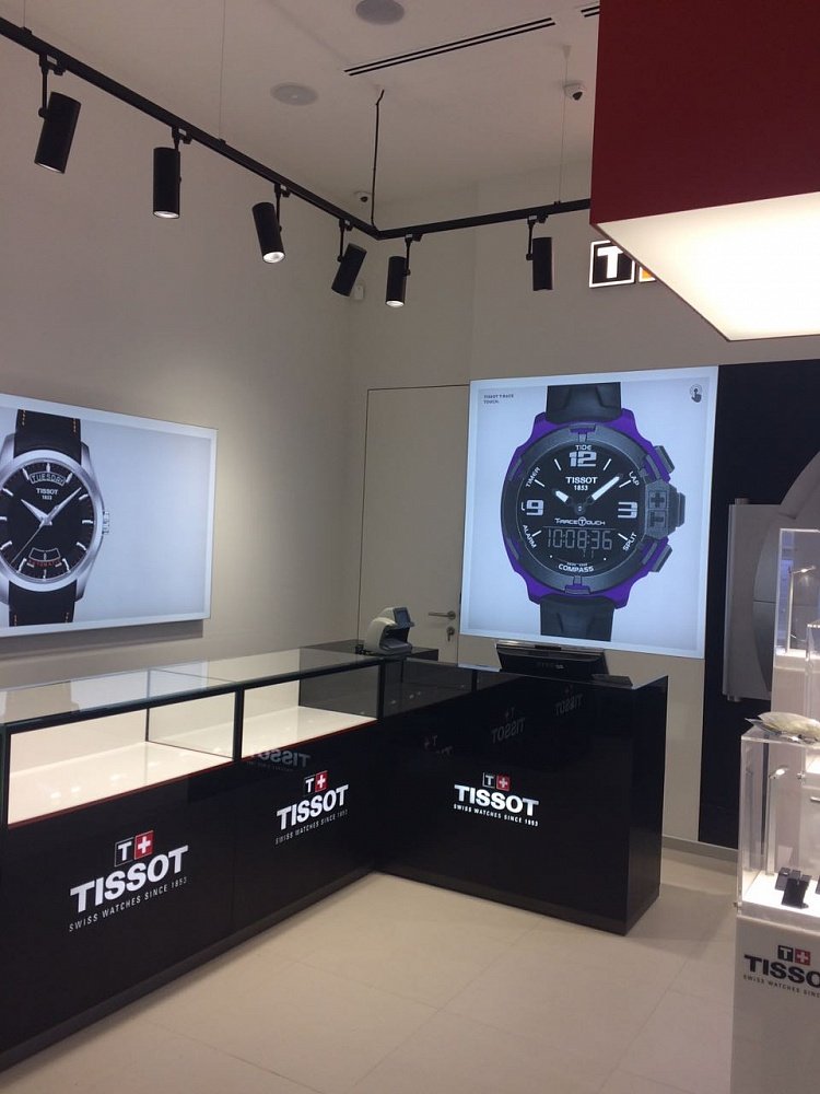 Освещение магазина швейцарских наручных часов Tissot